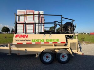 A FINN-T120 Hydroseeder loaded with hydroseeding materials.